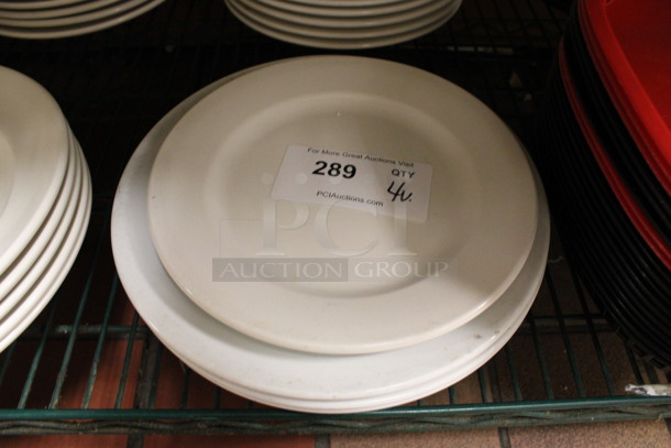 4 Various White Ceramic Plates. Includes 11x11x1. 4 Times Your Bid! (kitchen)