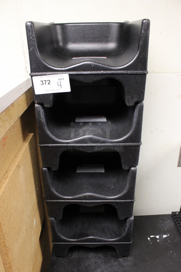 4 Black Poly Booster Seats. 13x12x9.5. 4 Times Your Bid! (drink kitchen)