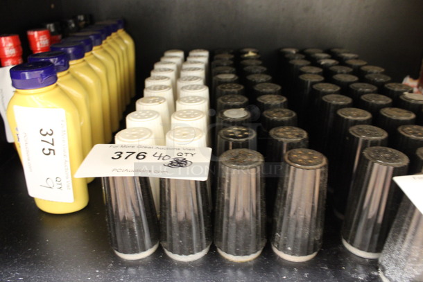 40 Salt / Pepper Shakers. 2x2x3.5. 40 Times Your Bid! (drink kitchen) - Image 1 of 3