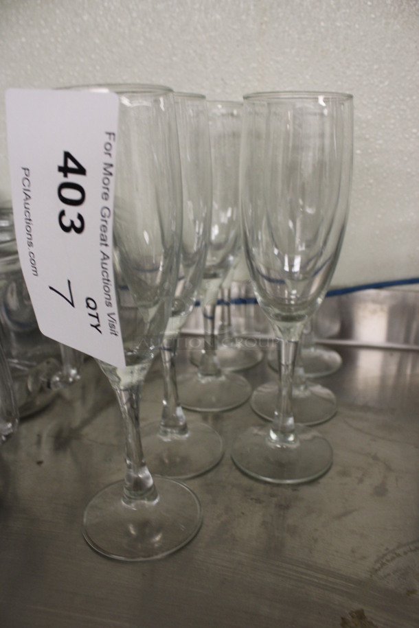 7 Champagne Flute Glasses. 2.5x2.5x7.5. 7 Times Your Bid! (drink kitchen)