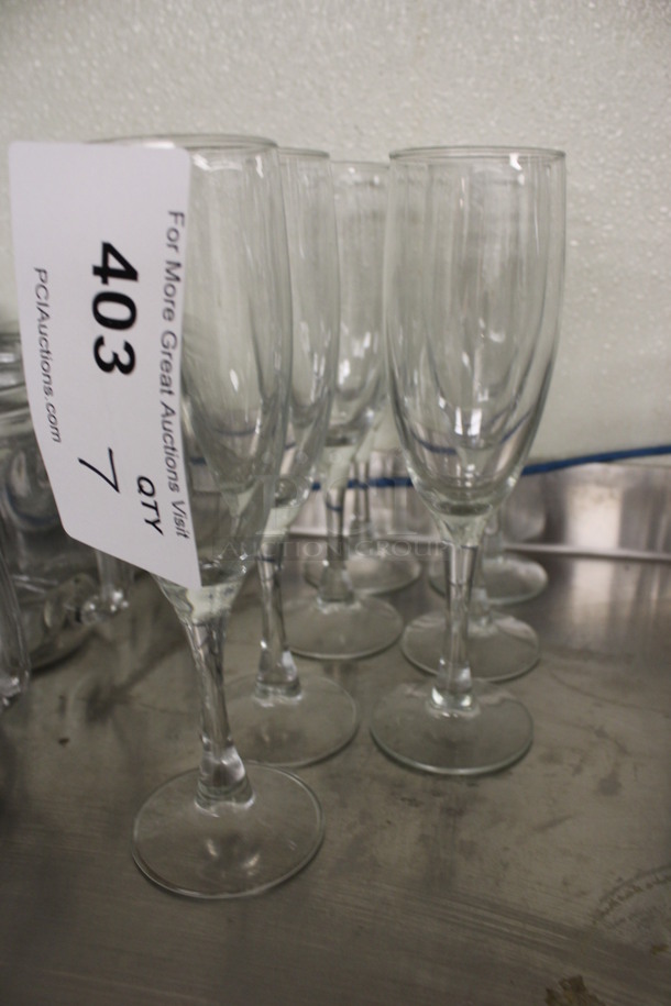 7 Champagne Flute Glasses. 2.5x2.5x7.5. 7 Times Your Bid! (drink kitchen) - Image 1 of 2
