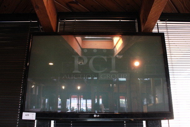 LG 50" Television and TV Mount. Buyer Must Pick Up - We Will Not Ship This Item. Tested and Working! BUYER MUST REMOVE. (bar) - Image 4 of 4