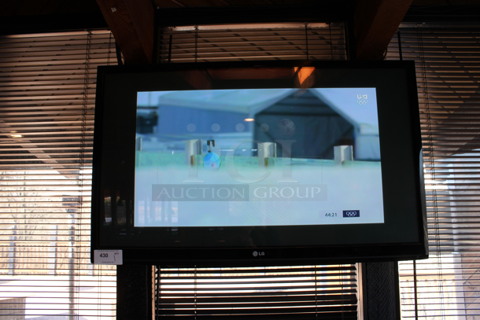 LG 50" Television and TV Mount. Buyer Must Pick Up - We Will Not Ship This Item. Tested and Working! BUYER MUST REMOVE. (bar)