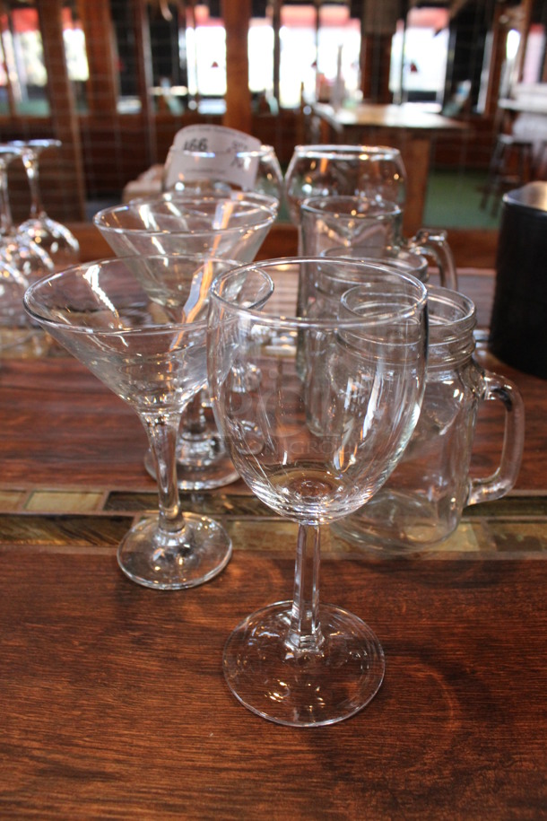 9 Various Glasses; Including Wine Glasses, Martini Glass and Mug. Includes 4x4x6. 9 Times Your Bid! (bar) - Image 1 of 3