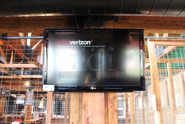 LG 37" Television and TV Mount. Buyer Must Pick Up - We Will Not Ship This Item. Tested and Working! BUYER MUST REMOVE. (dining room) - Image 1 of 5