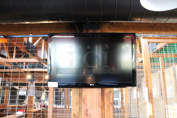 LG 37" Television and TV Mount. Buyer Must Pick Up - We Will Not Ship This Item. Tested and Working! BUYER MUST REMOVE. (dining room) - Image 4 of 5