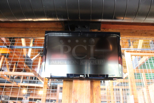 LG 37" Television and TV Mount. Buyer Must Pick Up - We Will Not Ship This Item. Tested and Working! BUYER MUST REMOVE. (dining room) - Image 5 of 5