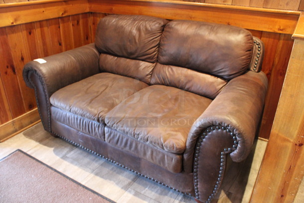 Brown 2 Person Couch w/ Nailhead Trim. 67x38x38. (dining room) - Image 2 of 5