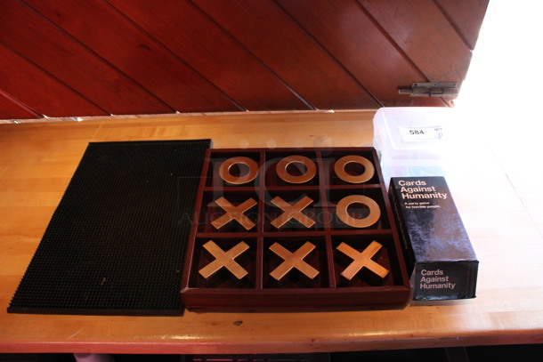 ALL ONE MONEY! Lot of Tic Tac Toe Game, Bar Mat and Cards Against Humanity. (bar on patio)
