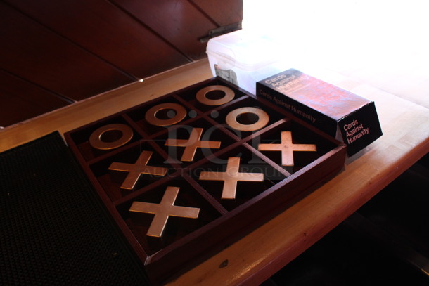 ALL ONE MONEY! Lot of Tic Tac Toe Game, Bar Mat and Cards Against Humanity. (bar on patio) - Image 4 of 5