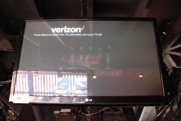 LG 37" Television and TV Mount. Buyer Must Pick Up - We Will Not Ship This Item. Tested and Working! BUYER MUST REMOVE. (bar on patio) - Image 1 of 6