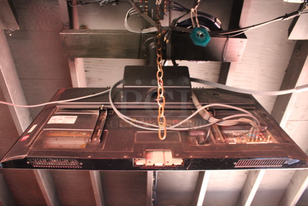 LG 37" Television and TV Mount. Buyer Must Pick Up - We Will Not Ship This Item. Tested and Working! BUYER MUST REMOVE. (bar on patio) - Image 4 of 6