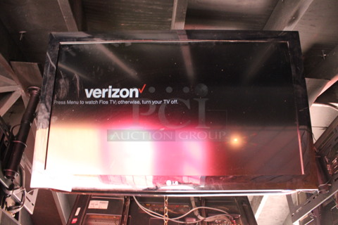 LG 37" Television and TV Mount. Buyer Must Pick Up - We Will Not Ship This Item. Tested and Working! BUYER MUST REMOVE. (bar on patio)