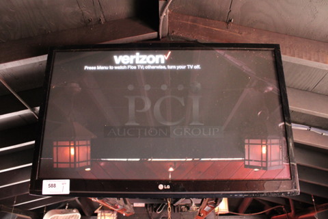 LG 37" Television and TV Mount. Buyer Must Pick Up - We Will Not Ship This Item. Tested and Working! BUYER MUST REMOVE. (bar on patio)