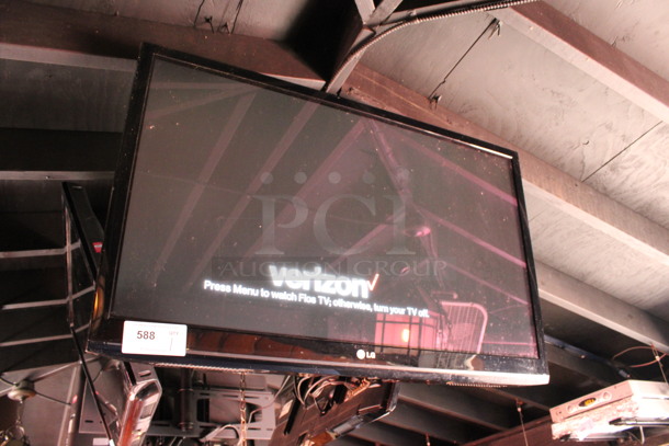 LG 37" Television and TV Mount. Buyer Must Pick Up - We Will Not Ship This Item. Tested and Working! BUYER MUST REMOVE. (bar on patio) - Image 2 of 4