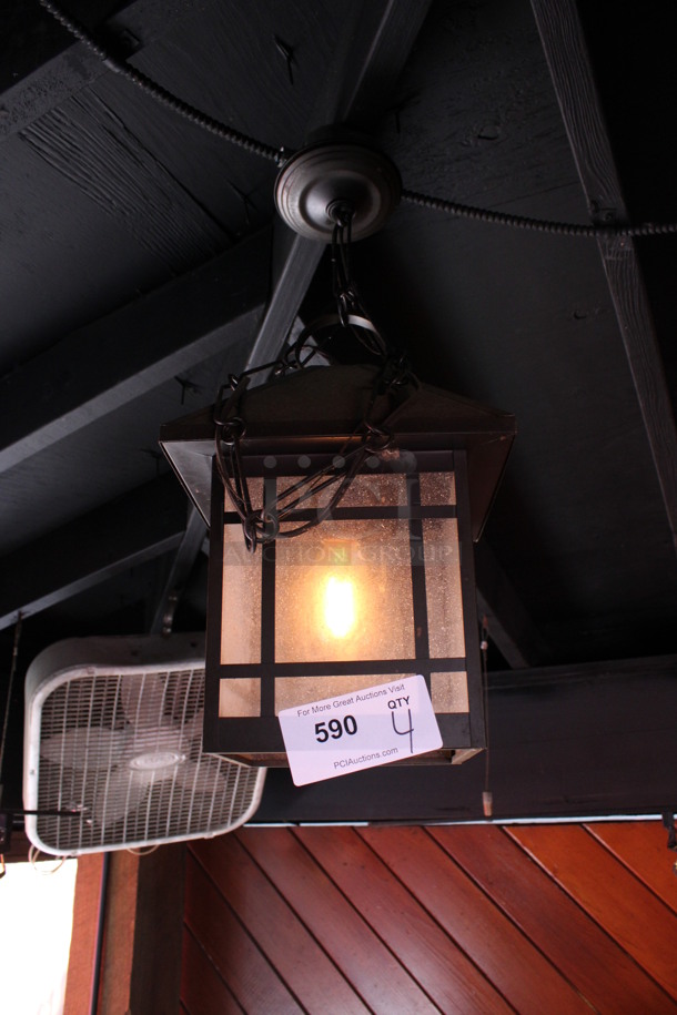 4 Metal Light Fixtures. BUYER MUST REMOVE. 10x10x12. 4 Times Your Bid! (bar on patio)