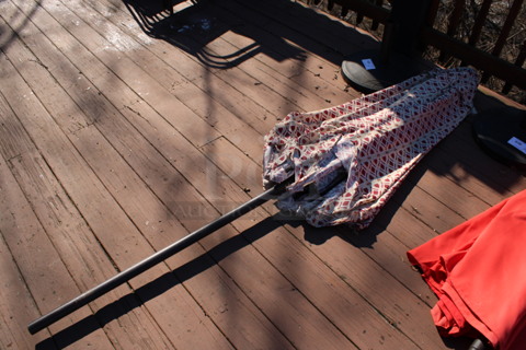Red and White Patio Umbrella and Metal Umbrella Base. 90", 17x17x2. (patio)