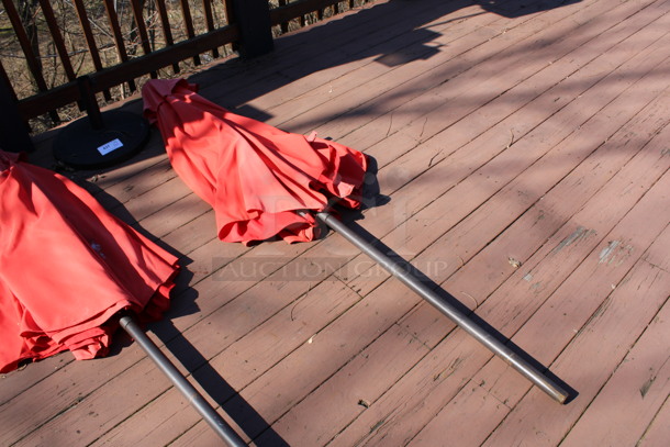 Red Patio Umbrella and Metal Umbrella Base. 90