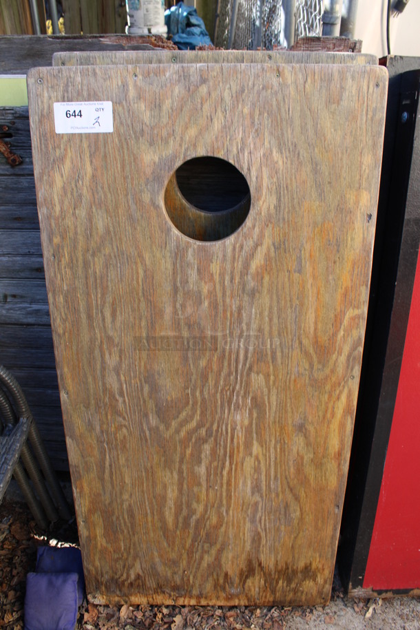 2 Wooden Cornhole Boards w/ 4 Bean Bags. 24x48x4. 2 Times Your Bid! (outside behind kitchen)