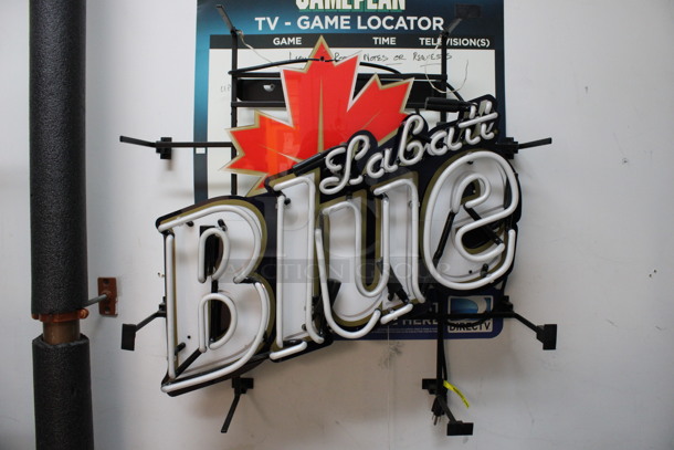 Wall Mount Labatt Blue Neon Sign. Does Not Power On. 25x8x26 (office closet)