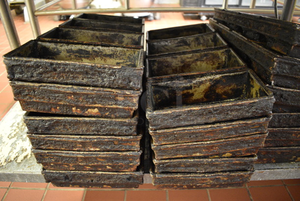 17 Metal 4 Loaf Baking Pans. 22x9.5x3. 17 Times Your Bid! (bakery kitchen) - Image 1 of 3