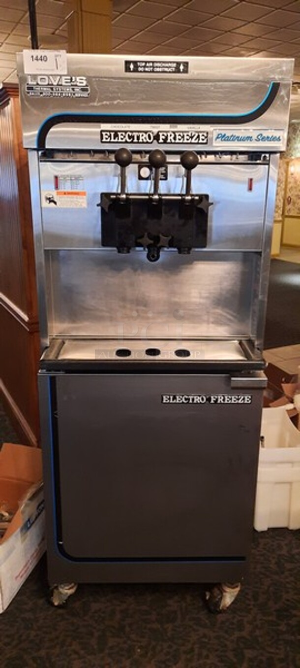 Electro Freeze Model 4000EP-232 Stainless Steel Commercial Air Cooled 2 Flavor w/ Twist Soft Serve Ice Cream Machine w/ Spare Parts on Commercial Casters. 208-230 volts, 3 Phase. 26x39x68.5 (buffet)