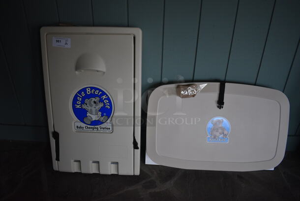 2 Koala Kare Tan Poly Wall Mount Diaper Changing Stations. 35x20x4. 2 Times Your Bid! (lounge)