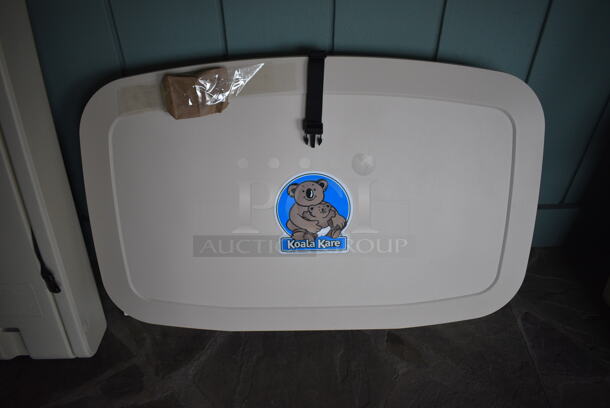 2 Koala Kare Tan Poly Wall Mount Diaper Changing Stations. 35x20x4. 2 Times Your Bid! (lounge) - Image 3 of 4