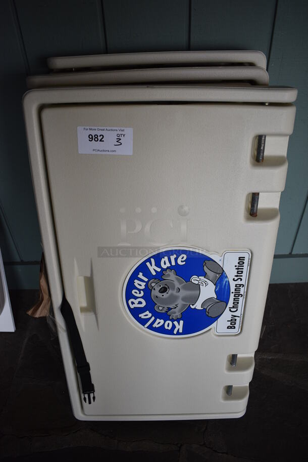 3 Koala Kare Tan Poly Wall Mount Diaper Changing Stations. 35x20x4. 3 Times Your Bid! (lounge) - Image 1 of 5