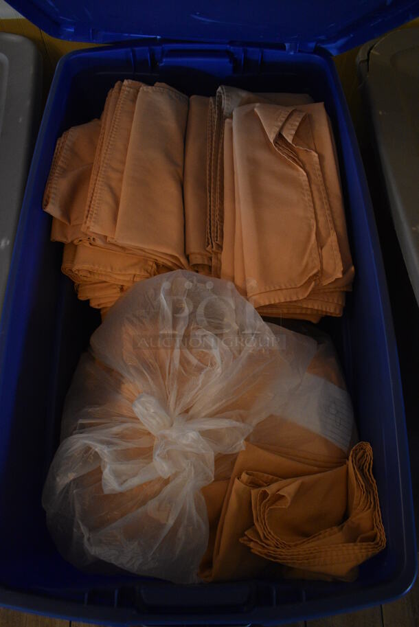 ALL ONE MONEY! Lot of Blue Poly Bin of Tablecloths! Includes 54x54. (main dining room) - Image 1 of 6