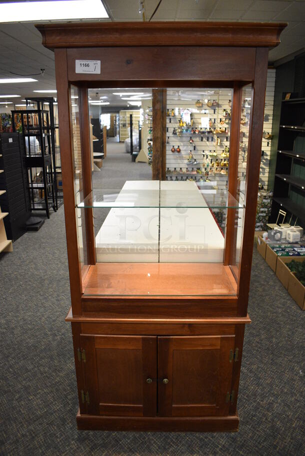 Wooden Cabinet w/ Glass Shelf and 2 Doors. 36x19x80. (garden center)