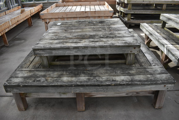 Wooden 2 Tier Stand. Comes In Two Pieces. BUYER MUST REMOVE. 72.5x72.5x17, 48x49x12. (greenhouse) - Image 1 of 4