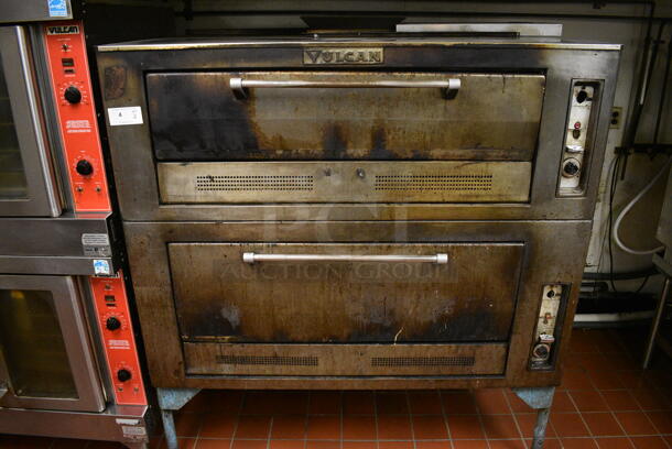 2 Vulcan Stainless Steel Commercial Natural Gas Powered Pizza Ovens. Model 7018A1 and 7019A1. 50,000 BTU. 60x42x65. 2 Times Your Bid! Unit Was In Working Condition When Restaurant Closed. (kitchen) - Image 1 of 9