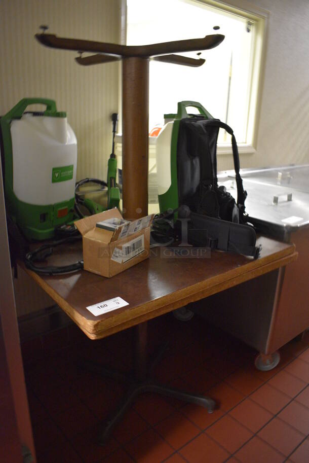 2 Wooden Tables on Metal Table Bases. Does Not Include Contents. 36x36x30. 2 Times Your Bid! (kitchen hallway)