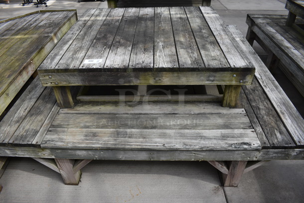 Wooden 2 Tier Stand. Comes In Two Pieces. BUYER MUST REMOVE. 72.5x72.5x17, 48x49x12. (greenhouse) - Image 1 of 3