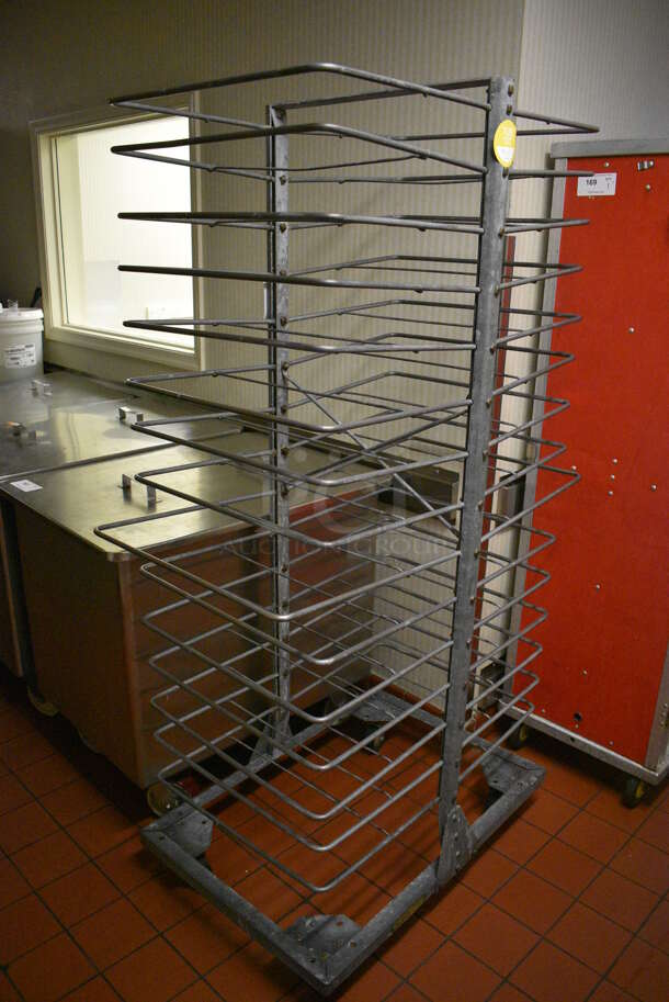 Metal Commercial Transport Rack on Commercial Casters. 25x41x71. (kitchen hallway)