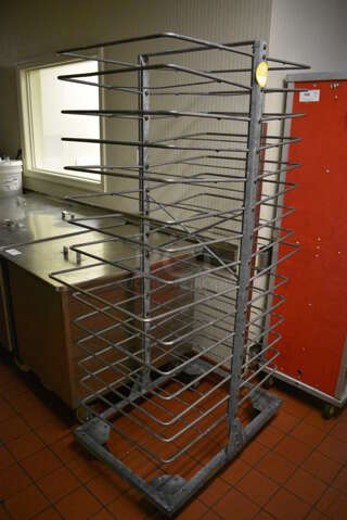 Metal Commercial Transport Rack on Commercial Casters. 25x41x71. (kitchen hallway)