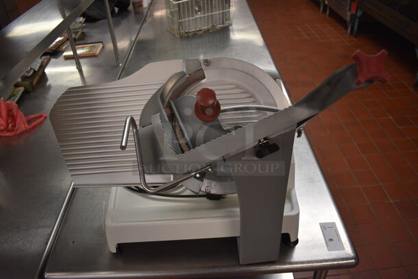 Berkel Model X13-PLUS Metal Commercial Countertop Meat Slicer. 120 Volts, 1 Phase. 28x27x26. Unit Was In Working Condition When Restaurant Closed. (kitchen)