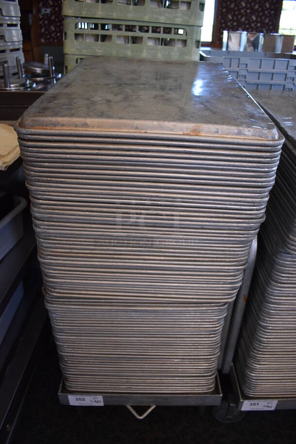 Metal Commercial Baking Pan Cart w/ Push Handle and 83 Full Size Metal Baking Pans on Commercial Casters. 29x21x33. 18x26x1. (back dining room) - Image 1 of 4