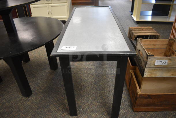 Black Wooden Table w/ Metal Tabletop. 56x22x30. (garden center)