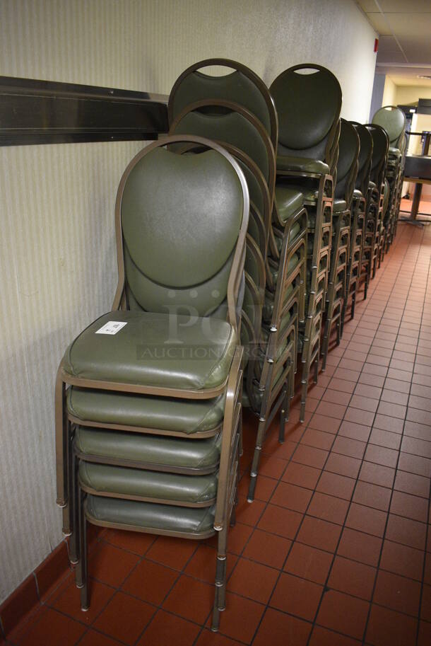 20 Green Stackable Banquet Chairs on Metal Frame. 17.5x20x36. 20 Times Your Bid! (kitchen hallway)