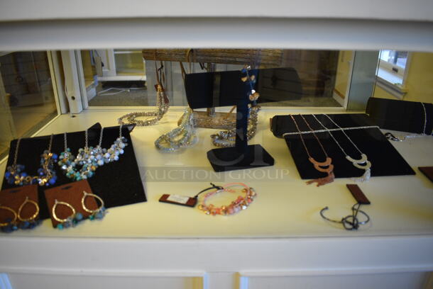 White Wooden Counter w/ Contents Including Jewelry. BUYER MUST REMOVE. 64x24x39. (yellow clothing store) - Image 2 of 7