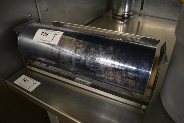 Plastic Wrap Roll on Metal Stand. 20x8x7.5. (bakery kitchen)