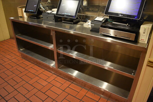 Stainless Steel Commercial Counter w/ Back Splash and 2 Under Shelves. Does Not Include Contents. BUYER MUST REMOVE. 96x23x40.5 (main dining room - POS Room) - Image 1 of 5