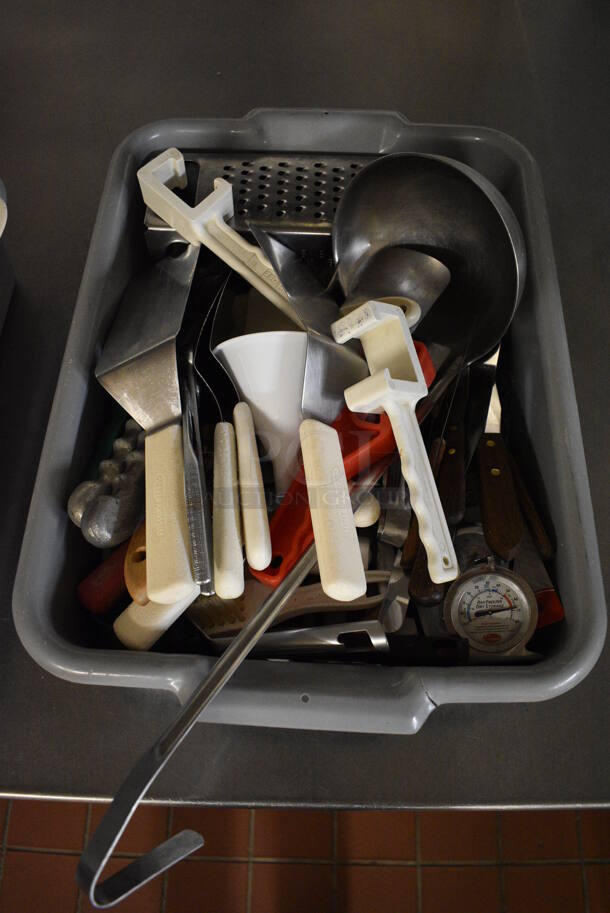 ALL ONE MONEY! Lot of Various Mertal Utensils Including Spatulas, Grater and Ladle in Gray Poly Bus Bin! 21.5x15x5. (bakery kitchen)