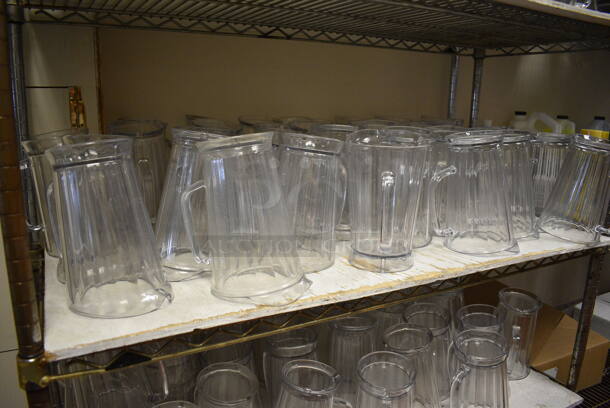Metro Chrome Finish 4 Tier Shelving Unit w/ 118 Clear Poly Pitchers. BUYER MUST DISMANTLE. PCI CANNOT DISMANTLE FOR SHIPPING. PLEASE CONSIDER FREIGHT CHARGES. 48x18x74. 7.5 5.5 8.5 (kitchen) - Image 3 of 5
