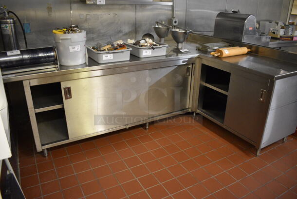 Stainless Steel Commercial L Shaped Table w/ 4 Doors and Under Shelves. Does Not Come w/ Contents. BUYER MUST REMOVE. 109x81x40.5. (bakery kitchen)