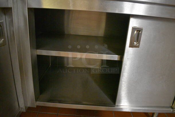 Stainless Steel Commercial L Shaped Table w/ 4 Doors and Under Shelves. Does Not Come w/ Contents. BUYER MUST REMOVE. 66x110x40.5. (bakery kitchen) - Image 4 of 4