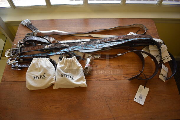 Wooden Table w/ Contents Including Belts. 40x40x30. (yellow clothing store) - Image 2 of 6
