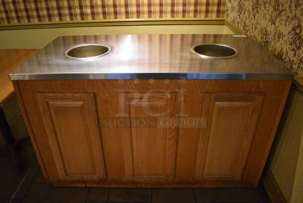 Stainless Steel Counter w/ 2 APW Wyott Steam Wells and Wooden Exterior. 60.5x30.5x35.5. Unit Was In Working Condition When Restaurant Closed. (buffet)
